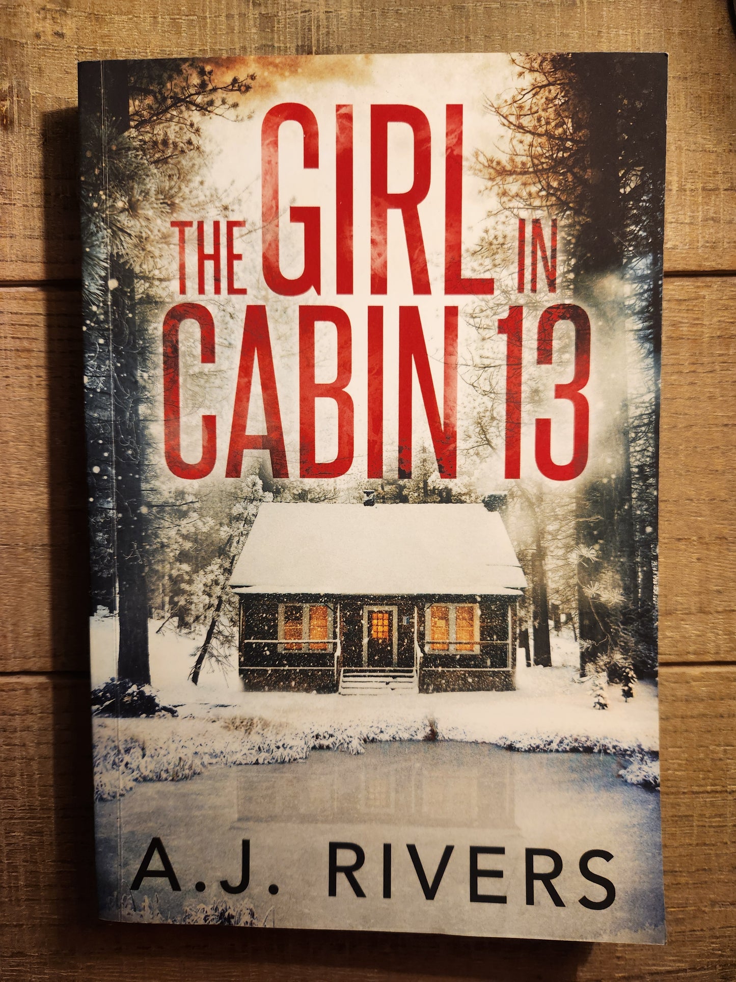 *Pre-loved* The Girl in Cabin 13 by A.J. Rivers